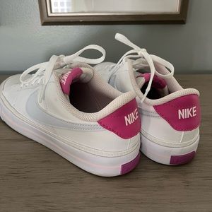 White/Hot pink Nikes. Size is B6–fit a women’s 8. Only worn twice!